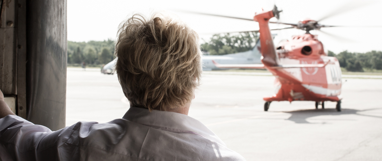 Two Ornge paramedics boarding an Ornge helicopter