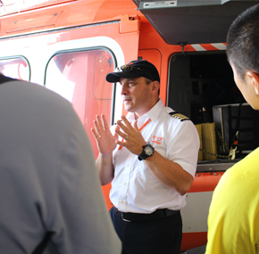 Ornge pilot speaking to attendees at Doors Open Toronto 2016 describing Ornge's AW139 aircraft