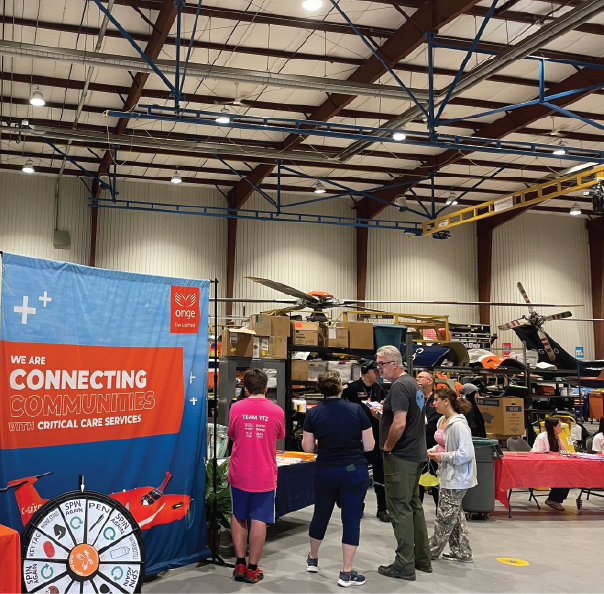 People participating in Girls Take Flight event.