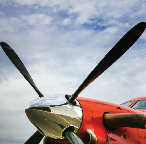 the propeller of an orange plane