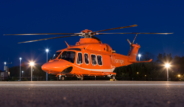 Leonardo AW139 on helipad at night
