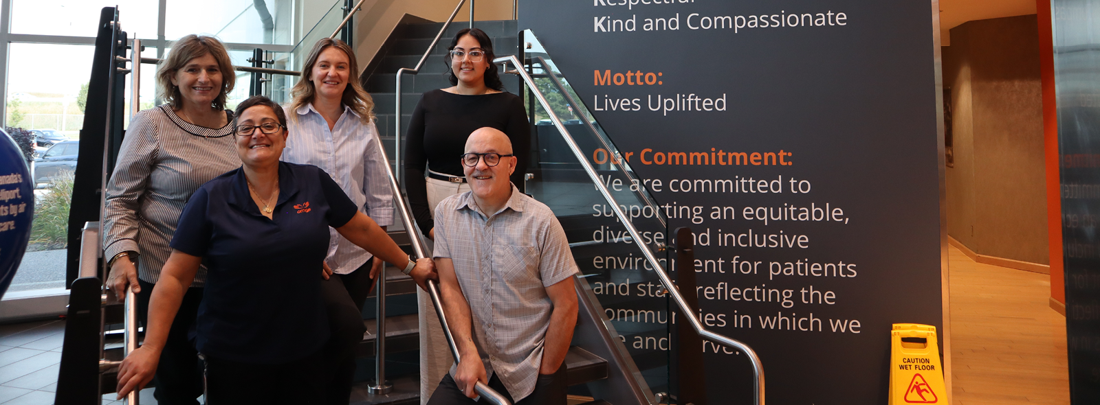 The Occupational Health and Safety team posing for a photo.