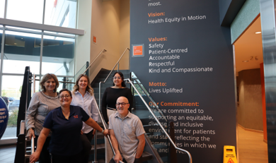 The Occupational Health and Safety team posing for a photo.