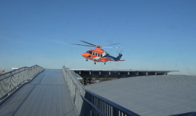 An Ornge helicopter landing on Sunnybrook's helipad.