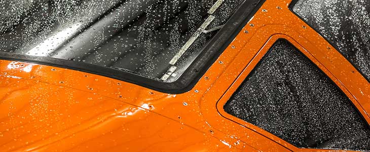 Closeup of the front of an Ornge aircraft