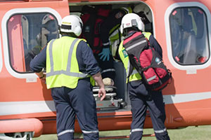 Paramedics entering helicopter