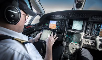 a picture of an Ornge Fixed Wing pilot in flight