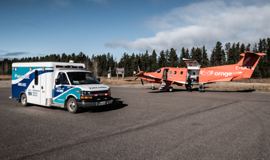 Ambulance and Plane on Tarmac